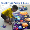 Giant space scene floor puzzle with planets, rockets, and astronauts for kids ages 3-7