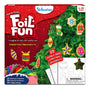 Skillmatics Foil Fun Christmas Ornaments activity kit packaging featuring a festive red glitter background, Christmas tree decorated with colourful foil ornaments, peel and press craft activity visuals, 25 double-sided ornaments, 150 foil sheets, golden strings, googly eyes and age label for children 4-99 years.