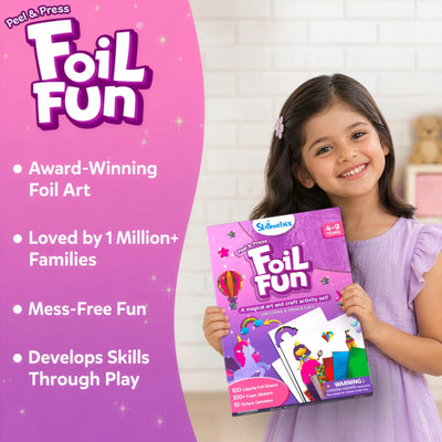 Young girl holding Foil Fun art kit with unicorn and hot air balloon designs