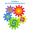 Set of 5 colorful interlocking plastic gears from Skillmatics Spinny Gears Pattern Pop on white background. Gears feature distinct bold patterns: purple with yellow stripes, red with yellow sunburst, blue with concentric circles, green with blue-yellow swirl, and yellow with purple cross design. Header reads 