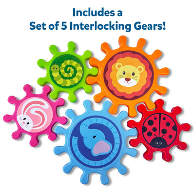 Set of 5 colorful interlocking plastic gears from Skillmatics Spinny Gears Animal Fun on a white background. Gears feature distinct animal illustrations: green caterpillar spiral, orange lion face, pink rabbit swirl, blue elephant, and red ladybug with black spots. Header reads "Includes a Set of 5 Interlocking Gears!" in dark blue bold text.