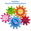 Set of 5 colorful interlocking plastic gears from Skillmatics Spinny Gears Animal Fun on a white background. Gears feature distinct animal illustrations: green caterpillar spiral, orange lion face, pink rabbit swirl, blue elephant, and red ladybug with black spots. Header reads 