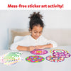Young girl creating colorful mandala sticker art with Dot it Mandala Art kit