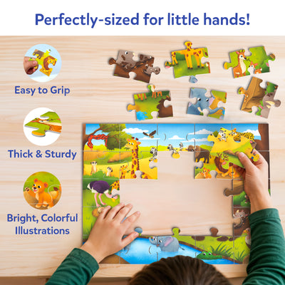 A child places a large puzzle piece into the Skillmatics All About Wild Animals 25-piece puzzle while several oversized pieces are spread across a wooden surface. Callouts highlight easy-to-grip pieces, thick and sturdy construction, and bright, colorful animal illustrations.