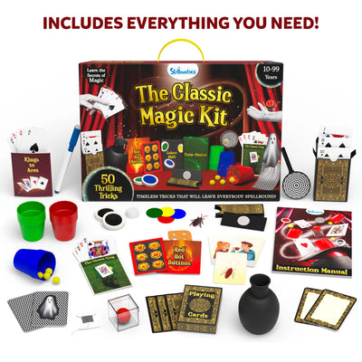 The complete contents of the Skillmatics Classic Magic Kit spread out on a white background. The kit includes various props like playing cards, coloured cups, yellow balls, a black magician’s wand, instructional manual, and other props for tricks such as ‘Kings to Aces’ and ‘Red Hot Buttons.’ The items are neatly arranged next to the product box, offering a detailed view of the magical tools included to perform 50 thrilling tricks.
