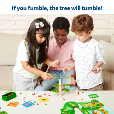 Three children playing Newtons Tree STEM toy with cards and red tokens for ages 6+