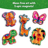 A set of five brightly colored foil-decorated animal magnets is arranged on a white background: a cheerful orange dog with floppy ears, a tall spotted giraffe, a pink and purple butterfly, a multicolored turtle with a smiling face, and a vibrant lion with a striped mane. Above them, the green glittery banner reads “Mess-free art with 5 epic magnets!”