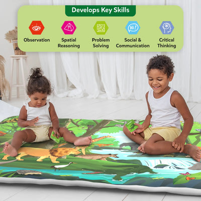Two young children sit on a jungle-illustrated cloth play mat indoors, each holding a small green animal card. Above them, a banner titled “Develops Key Skills” displays five labeled icons for observation, spatial reasoning, problem solving, social and communication skills, and critical thinking. The mat shows a river, lion, elephant, giraffe, crocodile, birds, and forest animals.