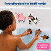 A young child plays in a bubble-filled bathtub while assembling soft foam farm animal puzzles. Completed pig and cow puzzles stick to the wet bath wall, while horse puzzle pieces are held in both hands. The image highlights perfectly sized pieces for small hands and suitability for ages 18 months to 4 years