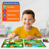 A cheerful young boy wearing a yellow shirt plays with Skillmatics Tape It! puzzle boards on a table. He holds a small animal sticker piece while smiling, surrounded by bright jungle-themed puzzle boards featuring lions, giraffes, zebras, and tigers. A colourful chart on the left highlights “Develops Key Skills” — Fine Motor, Logical Reasoning, Observation, and Spatial Reasoning — with playful icons.