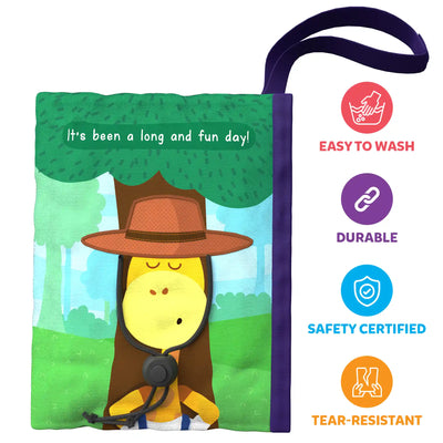 Soft children’s sensory book with cartoon monkey, hanging loop, and washable, durable features