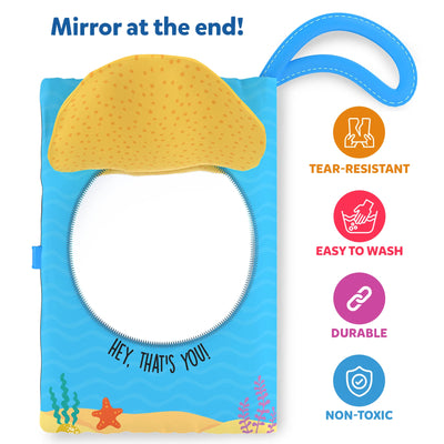 Soft fabric baby book with mirror and taco top showcasing tear-resistant washable durable and non-toxic features