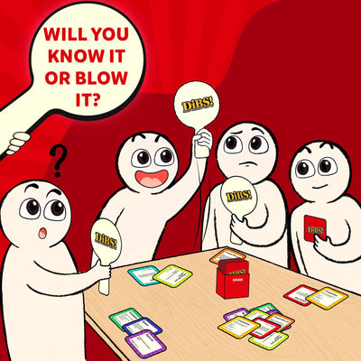 Group of people playing Dibs trivia card game with paddles and cards