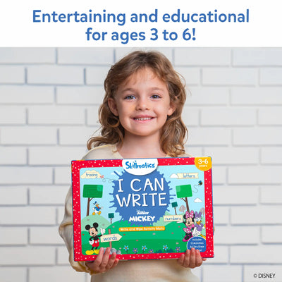 Young girl holding I Can Write Disney Junior Mickey Mouse reusable activity mats