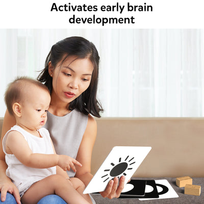Mother and baby engaging with high-contrast flashcards for infants 0-12 months