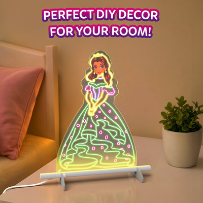 Skillmatics Light-Up Sketcher glowing on a bedside table as colorful artwork of a princess illuminates the transparent board. The setup includes a white stand and power cable, with a pink pillow, warm bedside lighting, and a potted plant in the background, illustrating room decor use.