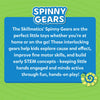 Skillmatics Spinny Gears Animal Fun product description on a green background. A blue rounded rectangle displays bold white text explaining the toy helps kids explore cause and effect, improve fine motor skills, and build early STEM concepts. 