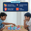 Promotional image titled “Core Benefits” showing two children playing Chess Kickoff at a table. Icons and text highlight benefits including improved focus and decision-making, critical thinking, strategic thinking, and confidence building. The scene shows thoughtful gameplay, balanced positioning, and an engaging home learning environment.