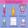 Display of Skillmatics Vet Set pretend veterinary accessories, including a toy injection syringe, pop-up ointment tube, pink stethoscope, eye drops bottle, prescription pad, and medicine bottle with toy tablets. The realistic play tools encourage interactive role-play and storytelling.
