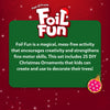 Skillmatics Foil Fun Christmas ornament activity graphic with a green information panel explaining the peel and press foil craft process. The design highlights creating DIY Christmas ornaments, encouraging creativity and fine motor skills, with a festive red background and ornament decoration.