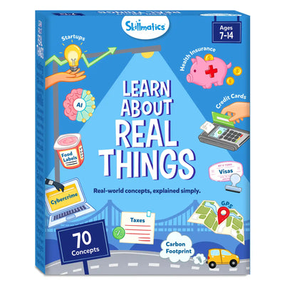 Skillmatics “Learn About Real Things” box for ages 7–14 featuring colorful icons of startups, AI, food labels, cybercrime, health insurance, credit cards, visas, taxes, GPS, and carbon footprint. A bridge skyline and road sit at the base beside a “70 concepts” sign, emphasizing practical life skills and real-world knowledge for children.