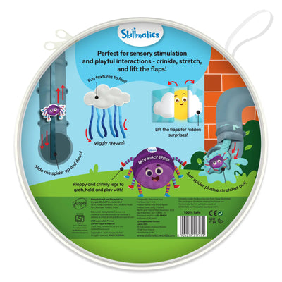 The back of a round Skillmatics package showing detailed illustrations of the sensory book’s interactive features. Visual callouts point to a sliding spider on a vertical strap, wiggly ribbon textures, lift-the-flap clouds revealing a sun, crinkly spider legs, and a stretchy plush spider emerging from a water spout. Safety icons, certification marks, barcode, and manufacturer details appear along the bottom edge.