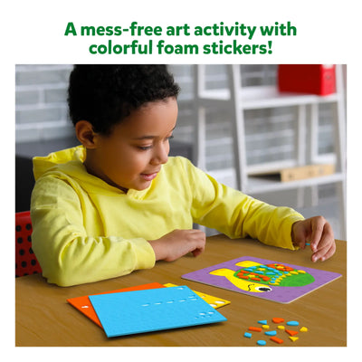 Child creating colorful animal foam sticker art for Fun with Foam Amazing Animals activity