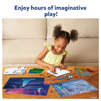 Young girl creating with Disney Frozen foil art kit for ages 4-9