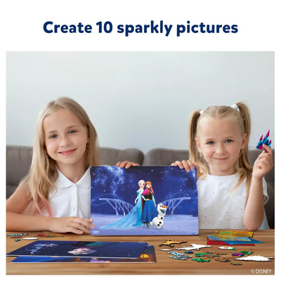 Two young girls holding up a completed Frozen themed puzzle from Foil Magic Wonderland