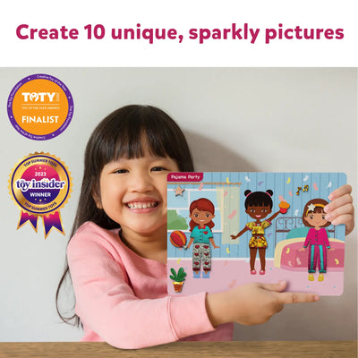 Young child happily showing a Pajama Party themed toy board with three doll figures