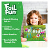 Smiling child holding colorful animal-themed foil art board from Foil Fun World Of Animals kit