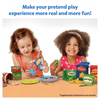 Two young girls playing with pretend grocery food items for realistic pretend play