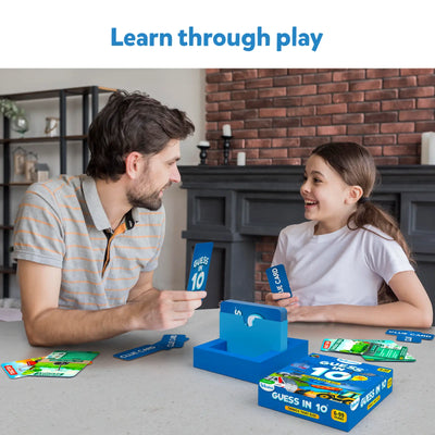 Father and daughter playing Guess in 10 Things That Go trivia card game