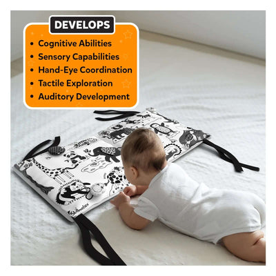 Soft black and white baby mat with animal illustrations and sensory features for development