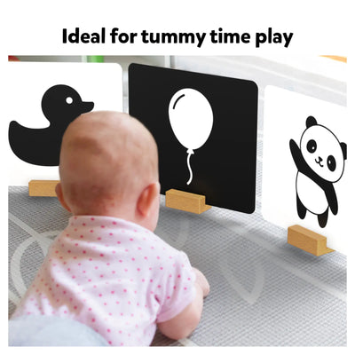 Baby playing on a mat with high-contrast flashcards from High Contrast Flash Cards for Infants