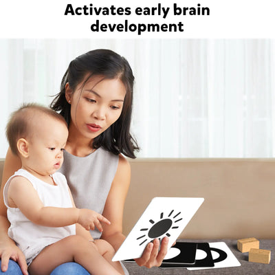 Mother and baby engaging with high-contrast flashcards for infants 0-12 months