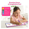Young girl drawing in pink-bound My Storybook Art Kit with purple marker for ages 5-10