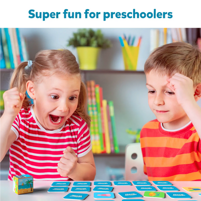 Two young children playing Memory Match game with colorful cards for ages 3 to 7