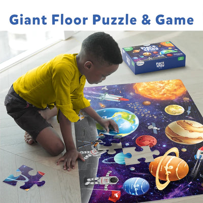 Giant space scene floor puzzle with planets, rockets, and astronauts for kids ages 3-7