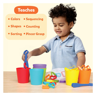 Young child playing with colorful Silicone Rainbow Sorting toy for learning and development