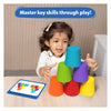Child stacking colorful plastic cups from Silicone Rainbow Sorting toy for early learning