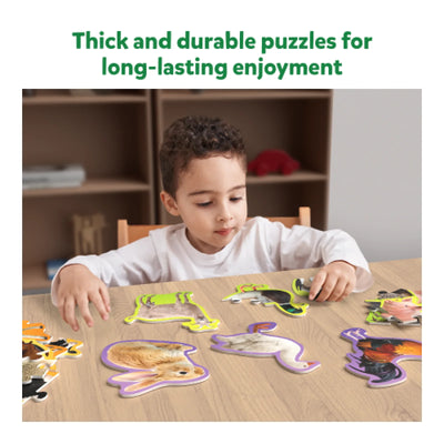 Child assembling animal-shaped puzzles from Step By Step Puzzle Combo for ages 3+