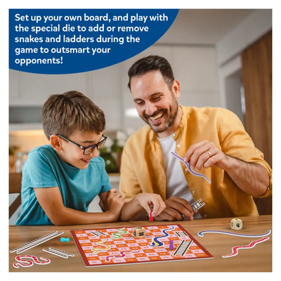 Man and boy playing Snakes and Ladders on a magnetic customizable board game
