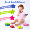 Baby playing with colorful food-grade silicone star-shaped stacking toys for ages 6 months to 3 years