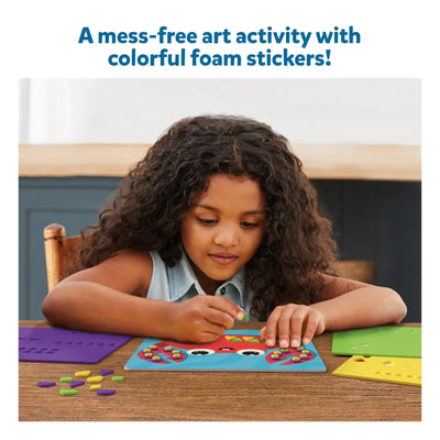 Young girl creating ocean-themed art with colorful foam stickers from Fun with Foam Under the Ocean