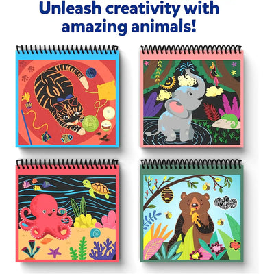 Four spiral-bound art pads with animal-themed scratch art designs for Magical Underwater Animal Adventure