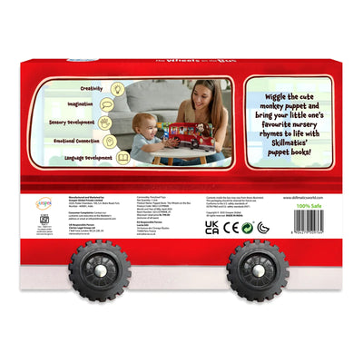 Red bus-shaped children’s book with monkey puppet promoting developmental skills for ages 6-24 months